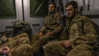 Бойци от американски отряд в Украйна застреляха ранен руски военнопленник