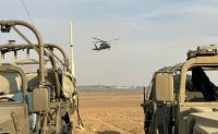 Израел нанесе удари по Сирия, но армията все още не е влязла в Ивицата Газа
