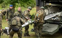 Германия се готви да приема до хиляда ранени военнослужещи на ден в случай на конфликт с Русия