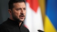 Зеленски присъства на препогребването на тленните останки на спрягания за нацист Андрей Мелник (ВИДЕО)